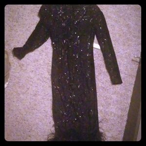 Sequins dress with feathers at the bottom